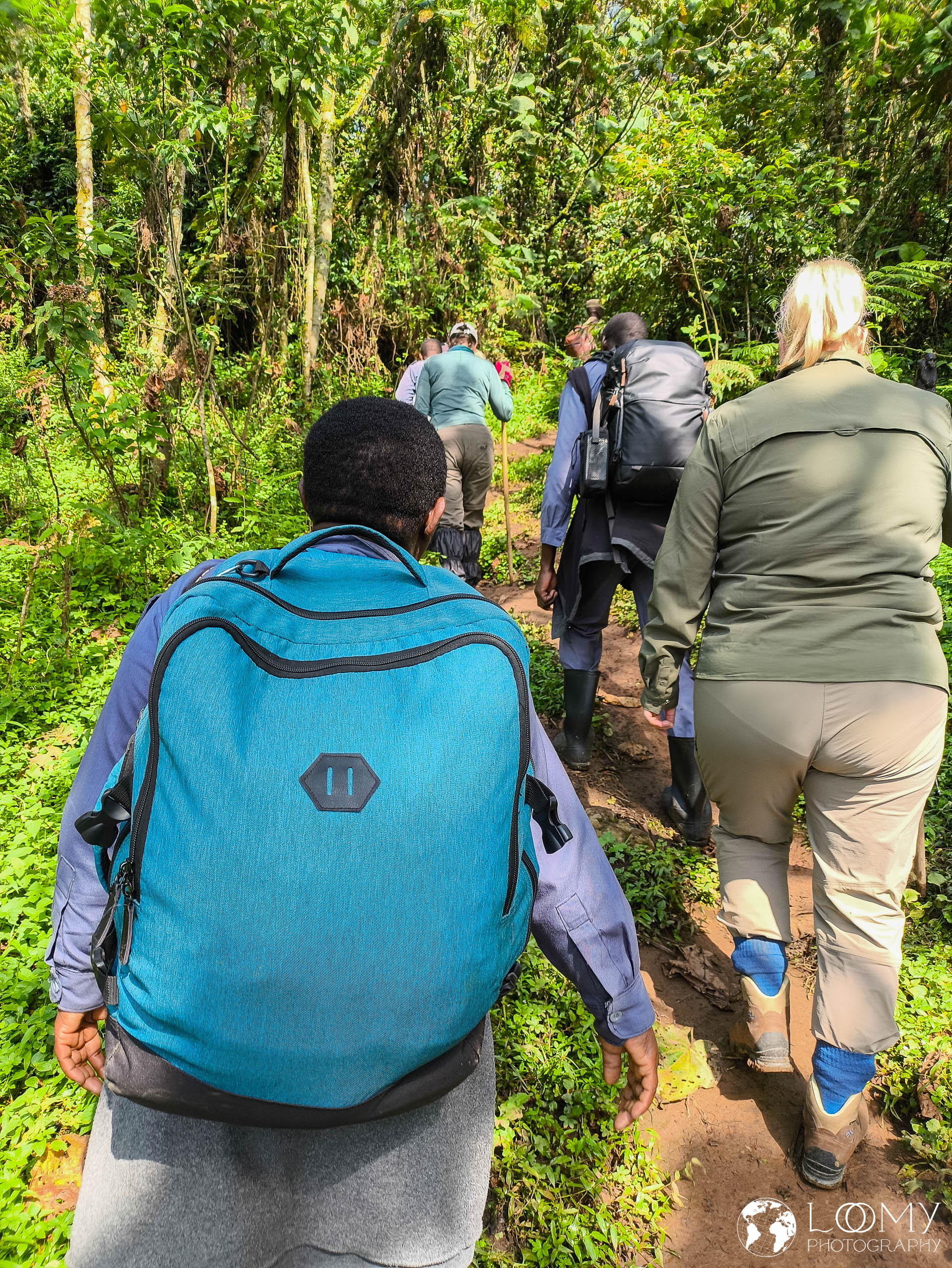 Träger/innen mit unseren Rucksäcken